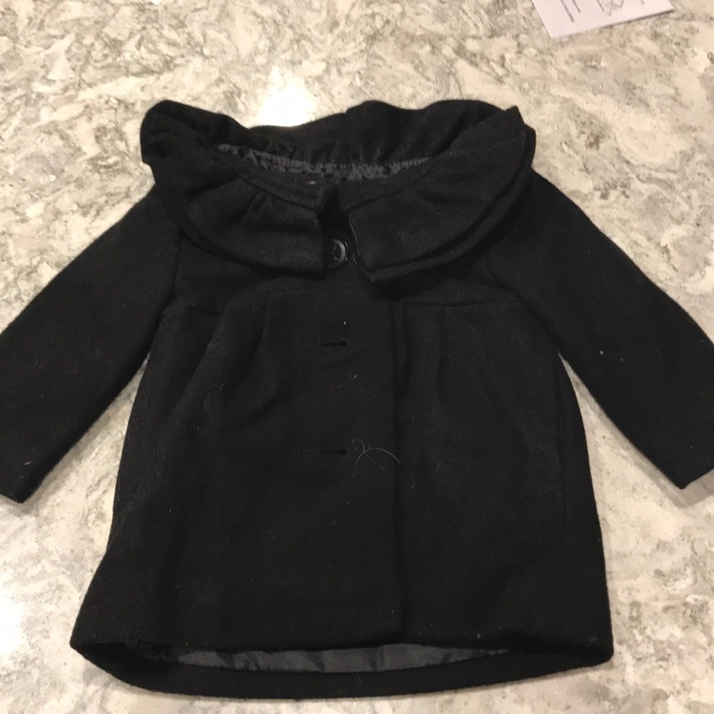 Black ruffle neck detail coat